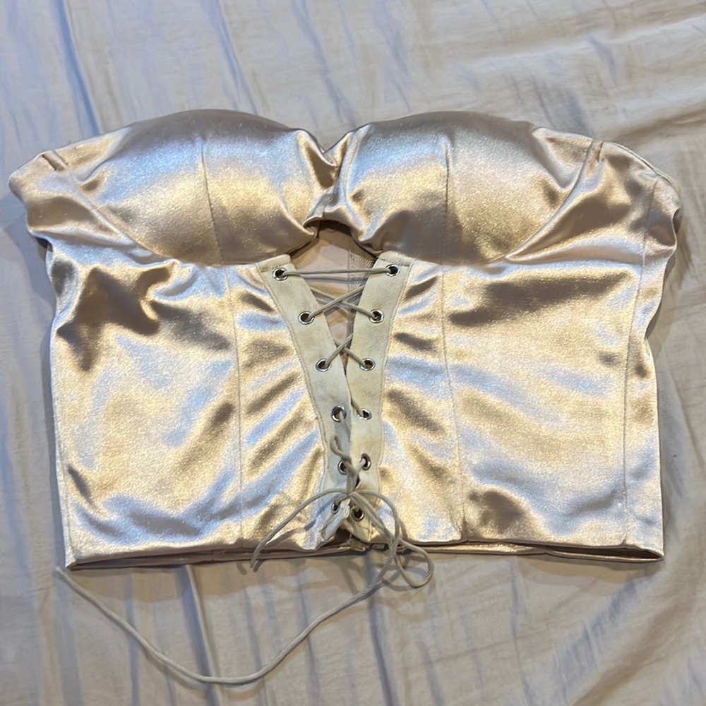 Better Be corset top. Used. Has some rips on the inside cups. $15 or best offer